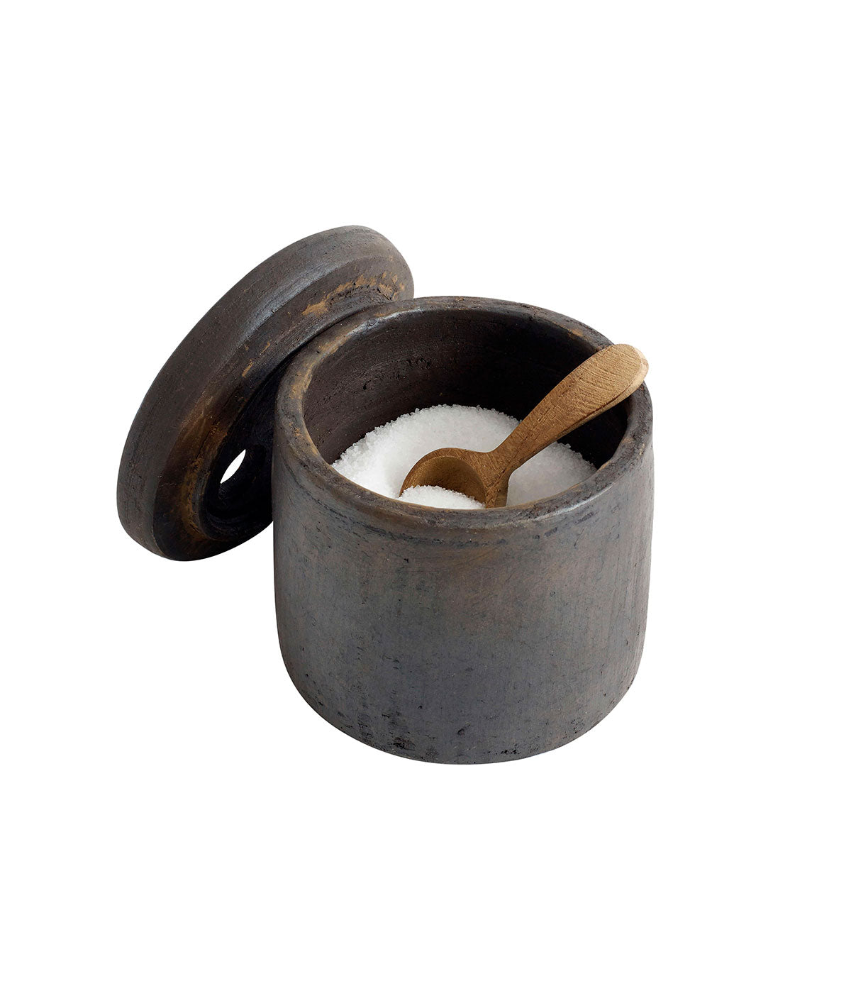 A terracotta salt and pepper set with a lid, displaying a rustic appearance, accompanied by a wooden spoon inside the container.