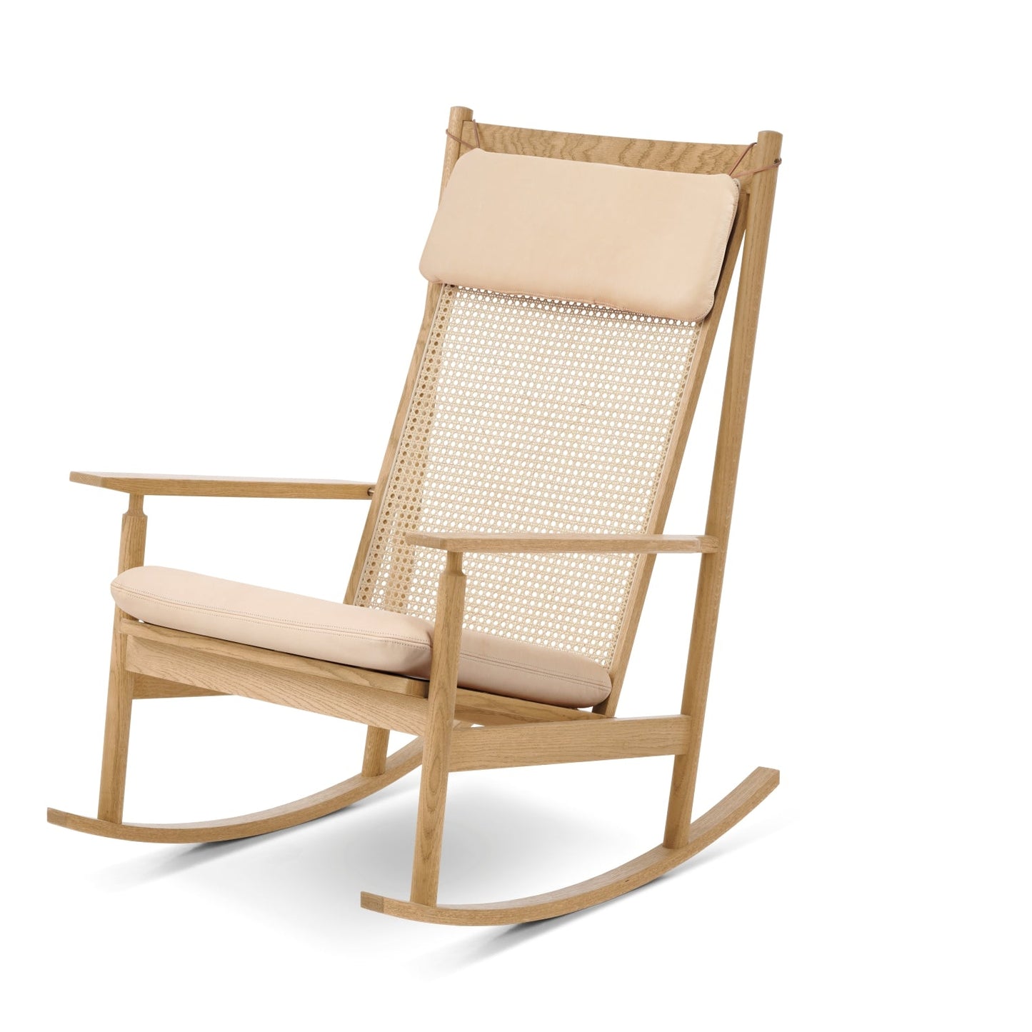 Wooden rocking chair with beige cushion on a white background