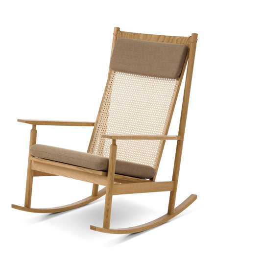 Wooden rocking chair with brown cushions on a white background