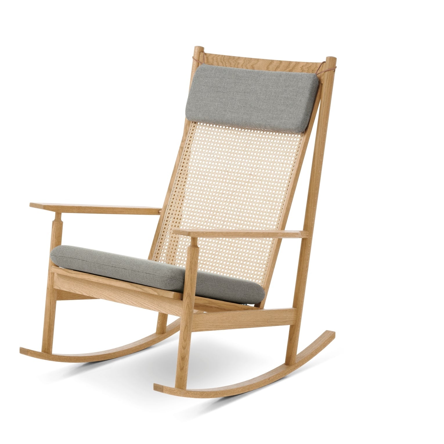 Wooden rocking chair with gray cushions on a white background