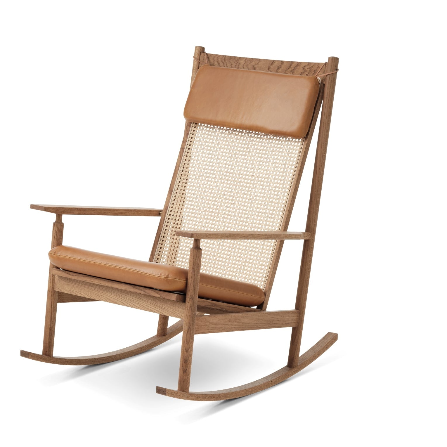 Brown rocking chair with woven backrest on a white background